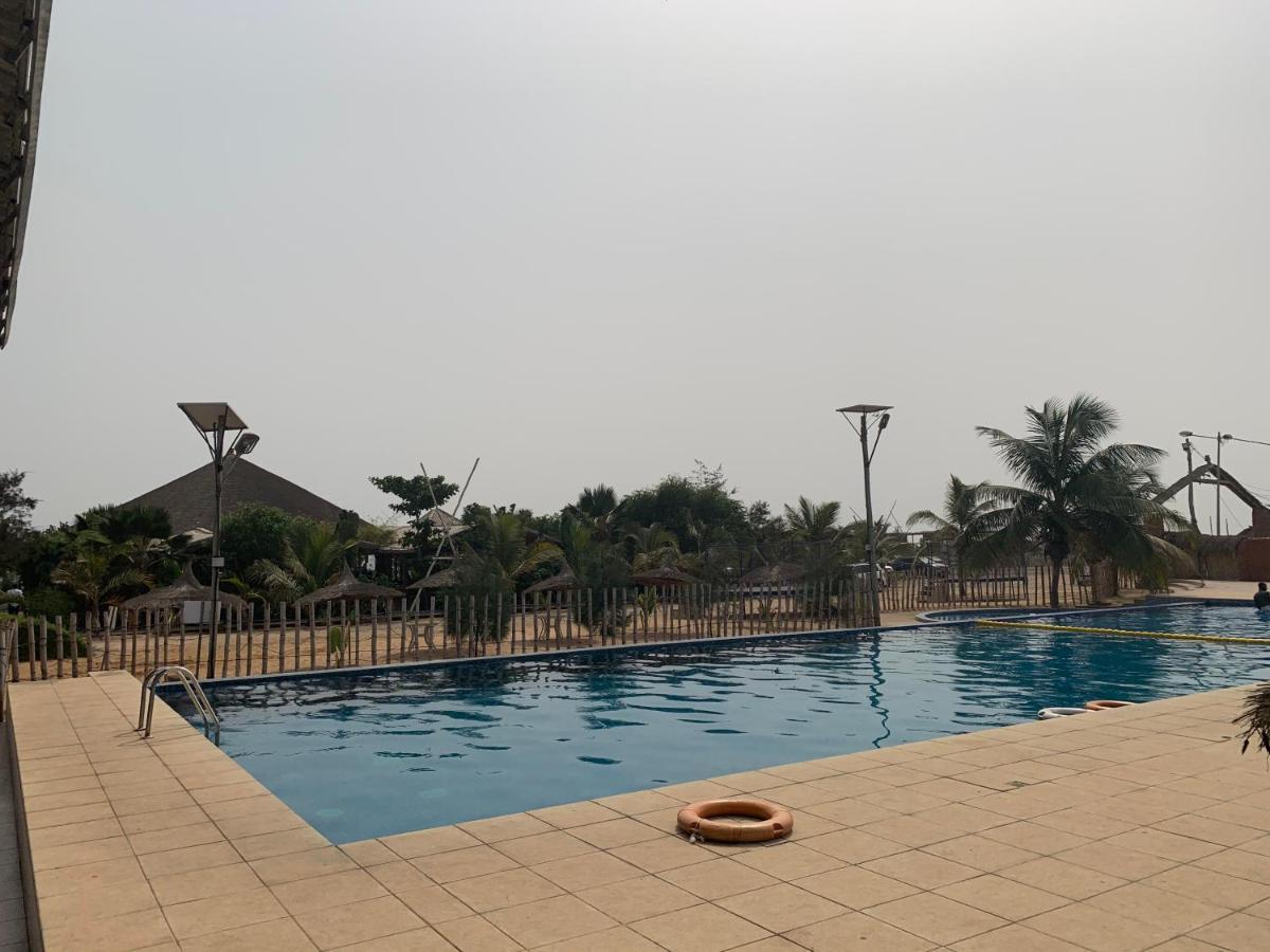 Marcelo Beach Club Hotel Lome Bagian luar foto